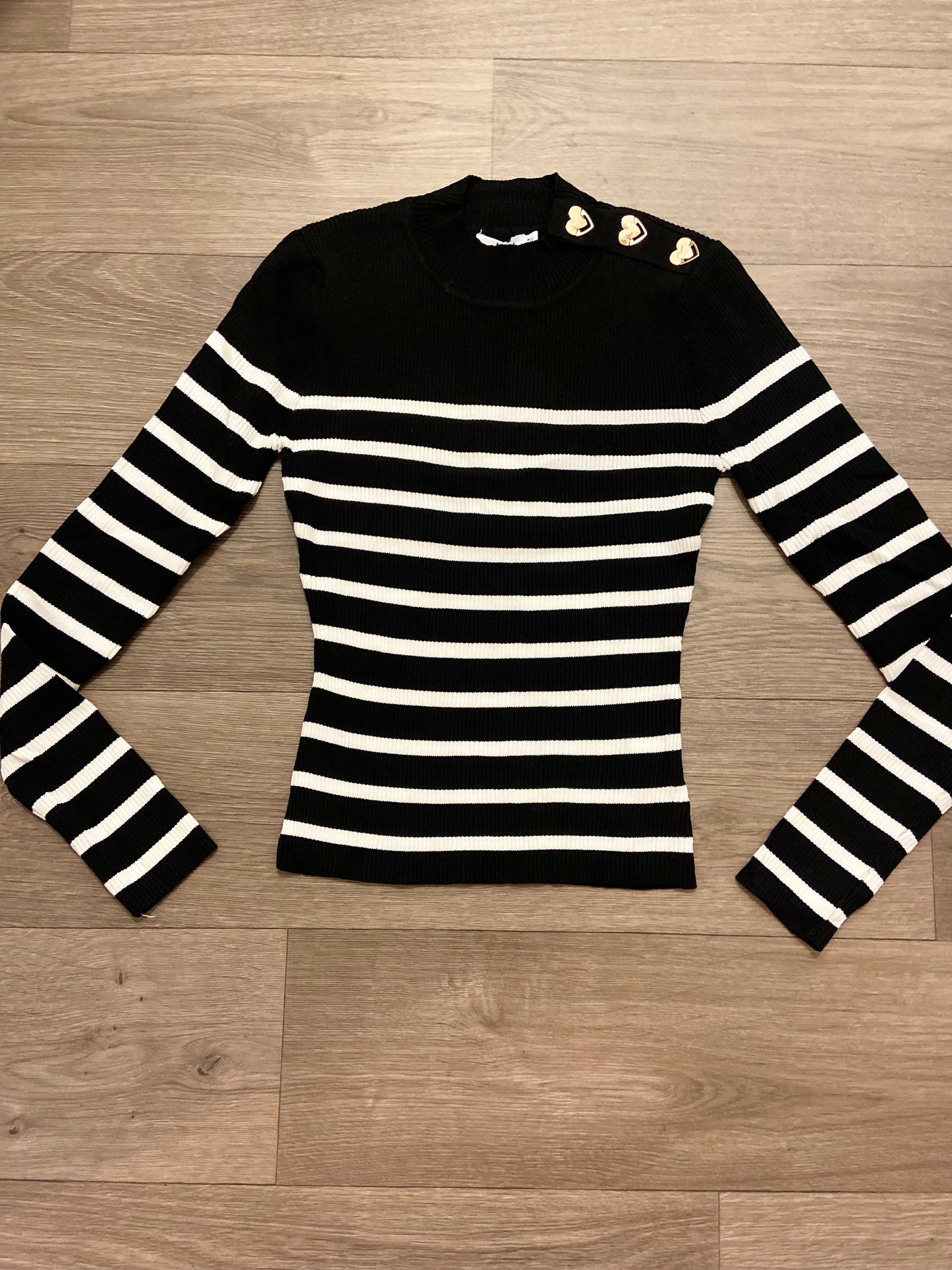 Stripe jumpers with heart buttons