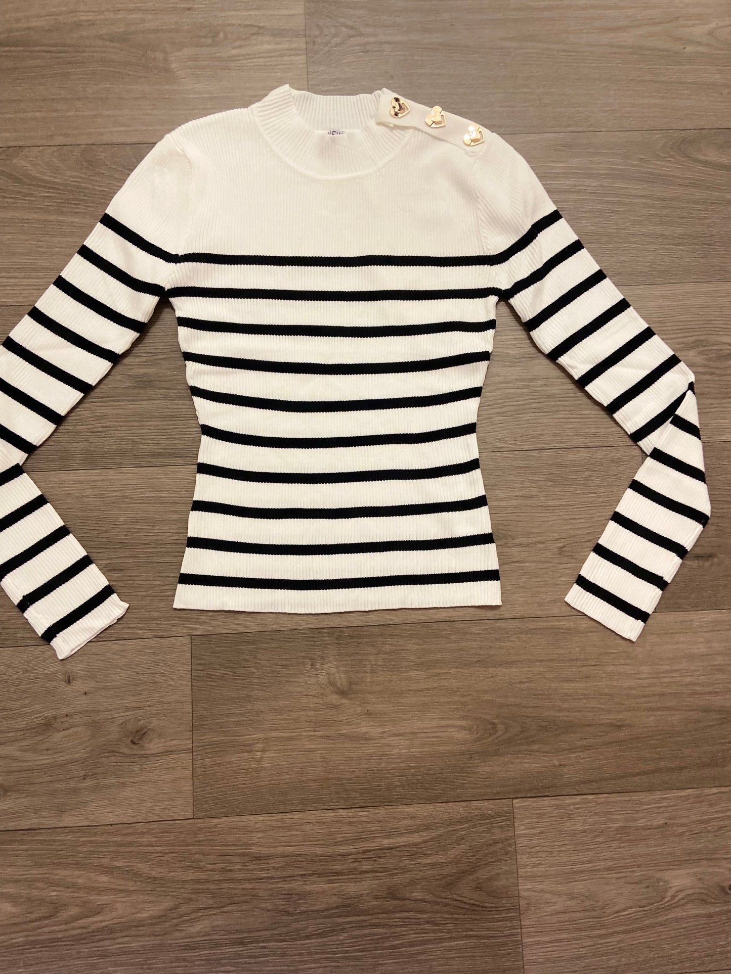 Stripe jumpers with heart buttons