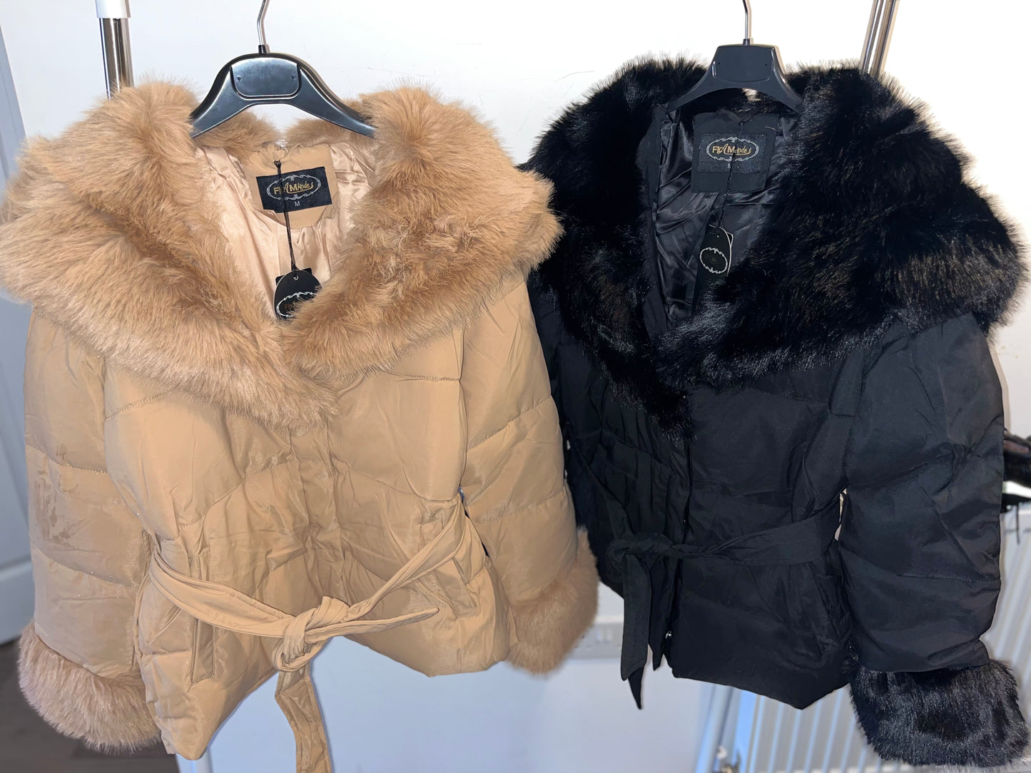 Fur coats with fur cuffs and tie belt